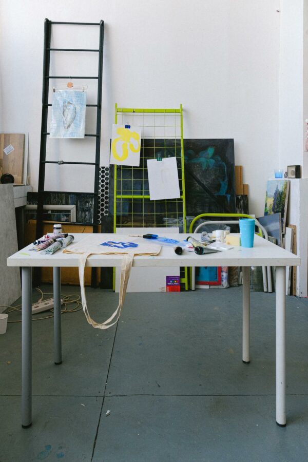 Table with art supplies in studio